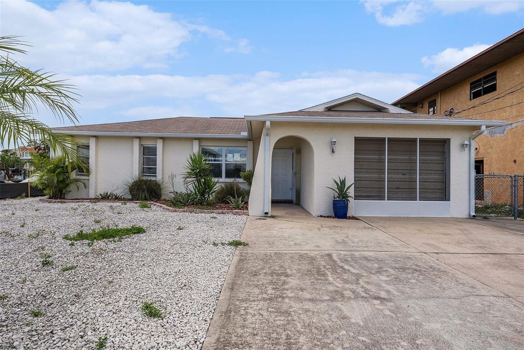 Photo of 13925 Hatcher Avenue, Hudson, FL 34667 (MLS # TB8413108)