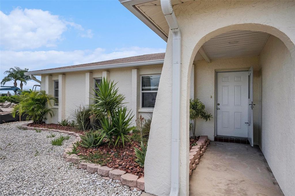 Photo of 13925 Hatcher Avenue, Hudson, FL 34667 (MLS # TB8413108)