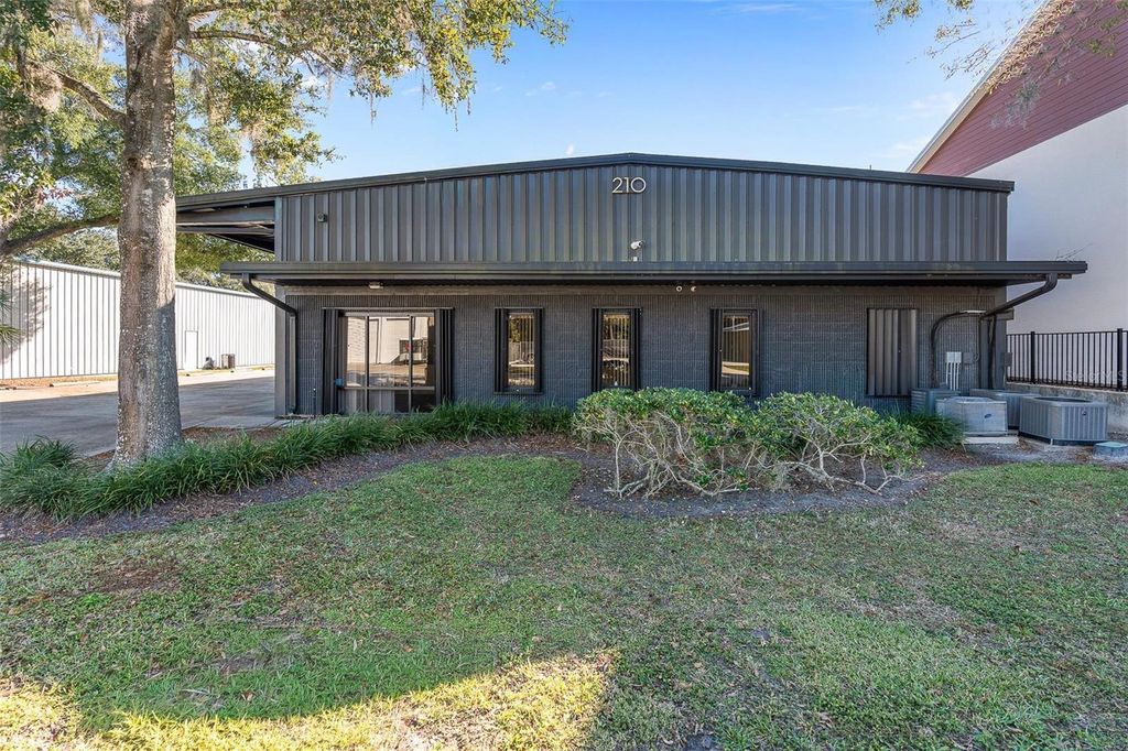 Photo of 210 E Palmetto Avenue, Longwood, FL 32750 (MLS # O6369621)