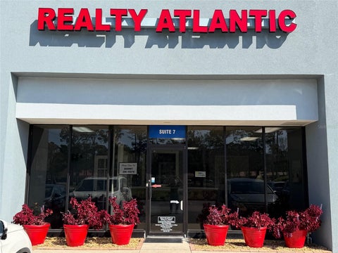 Photo of 4984 Palm Coast Parkway NW #7, Palm Coast, FL 32137 (MLS # FC320628)