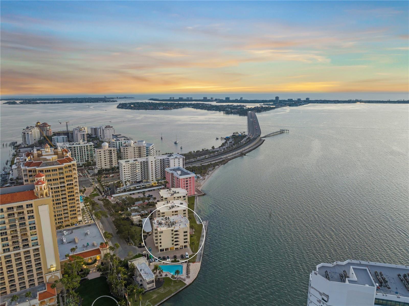 Welcome to Lawrence Pointe, a coveted boutique community of just three low-rise buildings, offering only 42 exclusive residences, perfectly situated near downtown Sarasota and nestled along the pristine Sarasota Bay. This unit has been completely reimagined with luxurious updates that elevate both comfort and style, creating an exceptional retreat for daily living. A few noteworthy enhancements include brand-new Viking appliances—refrigerator, dishwasher, microwave as well as a stunning Café range. The kitchen now boasts a newly enlarged island with a striking Cambria quartz waterfall edge, complemented by Cambria quartz countertops in both the family room and bathrooms. Every detail was meticulously designed for sophistication and ease with no item being overlooked. Relish in the mesmerizing evening sunsets from your private vantage point or take a leisurely stroll to downtown Sarasota, where world-class dining, shopping, and entertainment are all at your fingertips. Additionally, there is a private gate providing access to the grounds of the Ritz-Carlton creating nearly effortless access to Jack-Dusty. Not to be overlooked is the proximity to St. Armands circle and Lido beach. This is truly a rare opportunity to combine the experience of waterfront views while enjoying the benefits of city life.