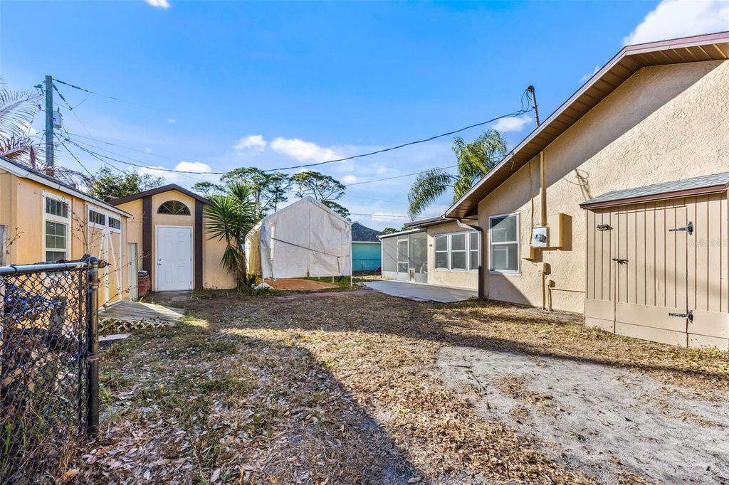 Photo of 100 Seahorse Circle SE, Palm Bay, FL 32909 (MLS # O6380990)