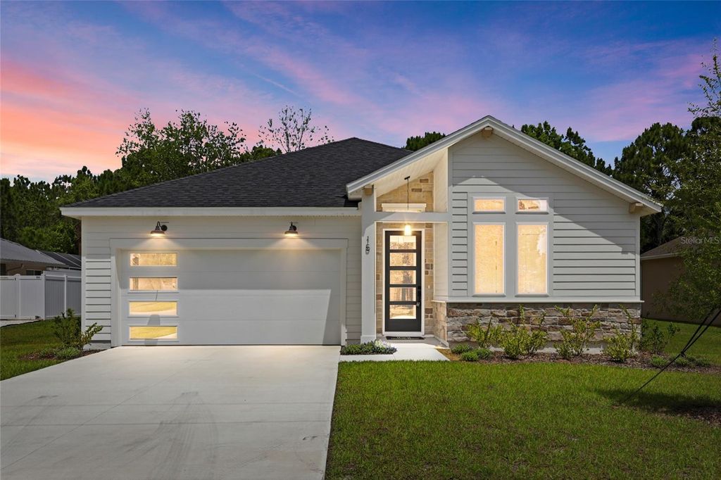 Photo of 15 Ulmus Place, Palm Coast, FL 32164 (MLS # FC317699)