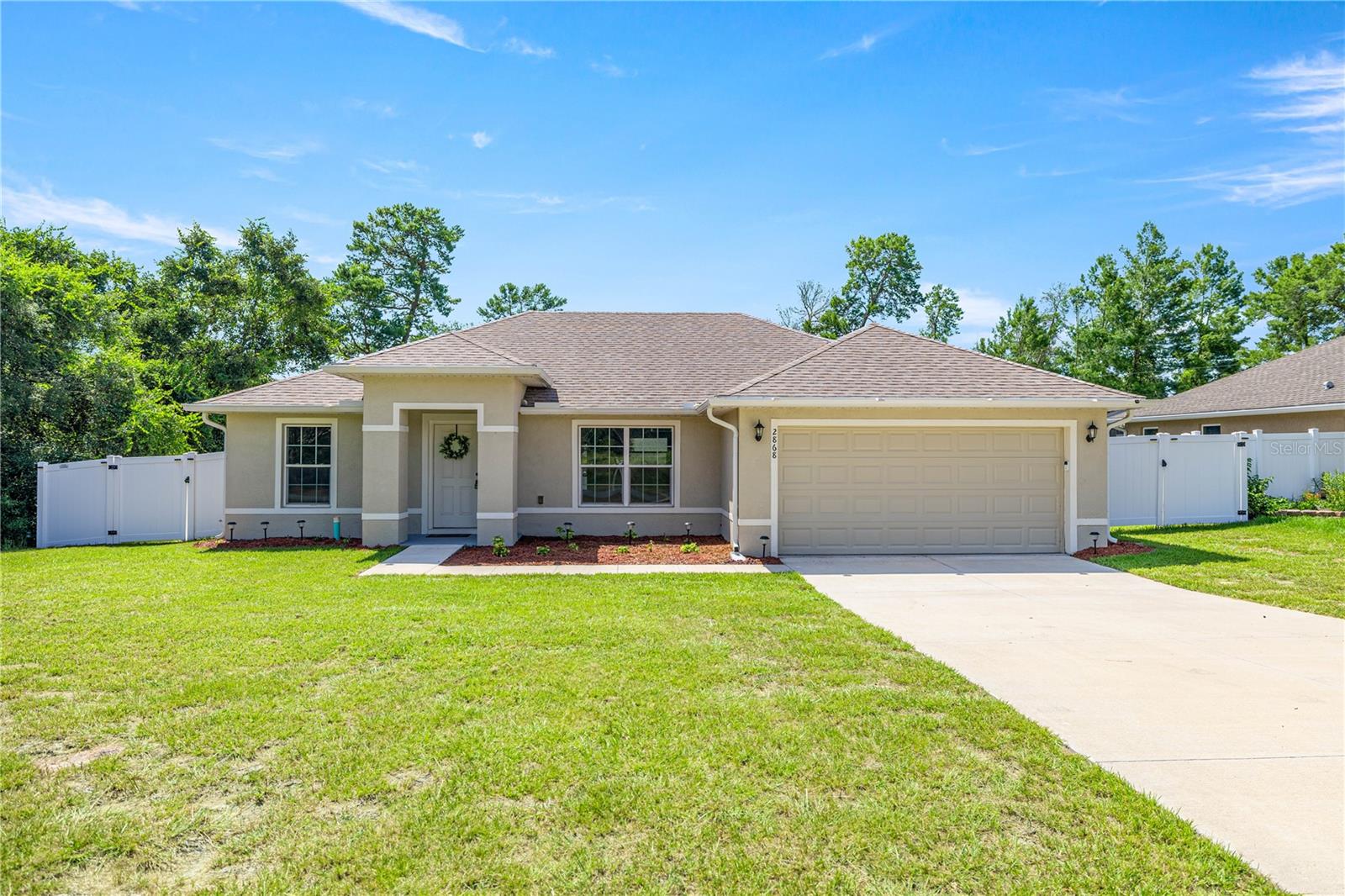 For Rent – Available Now! This beautifully maintained 3-bedroom, 2-bathroom home offers comfort, style, and space in a peaceful setting. Step inside to find no carpet throughout, creating a clean and low-maintenance environment. The expansive kitchen features shaker-style cabinetry, granite countertops, and ample room for cooking and gathering. Enjoy Florida living year-round from the screened-in lanai overlooking the fully fenced, large backyard—perfect for relaxing or entertaining. Additional highlights include a dedicated laundry room with washer and dryer included, Water softener system, TESLA wall charger, a quiet street with no rear neighbors, a playground, and beautiful landscaping that enhances the curb appeal. This home combines comfort and convenience with modern finishes and thoughtful touches throughout.