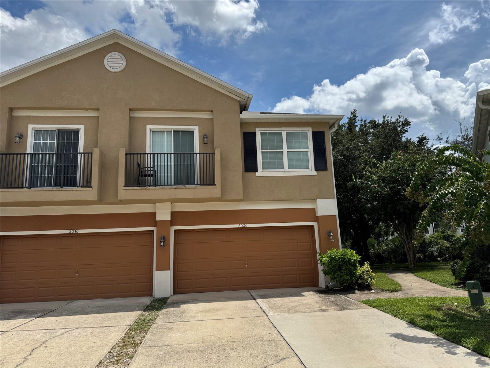 Bright and airy 3BR/2.5BA end-unit condo in a prime location close to schools, shopping, dining, and quick access to I-4. Thoughtful floor plan with separate living/dining room up front and a kitchen–family room combo in back. The open kitchen features attractive dark cabinetry and plenty of counter space for cooking and entertaining. Enjoy the private back patio for morning coffee or evening relax time. An attached 2-car garage offers easy parking and extra storage. Well-kept community with a sparkling pool. Call your realtor today for your private tour .