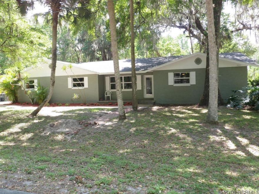 This home has been gutted and completely remodeled.    Hardwood Cabinets in kitchen.  Granite counters.  Bamboo wood flooring. Great room, VAULTED CEILING , Spacious home on large corner lot, just over 1/2 acre.  Screened back porch and covered front porch. Nice shade trees.   Note living area!!   NEW ROOF and ALL NEW WINDOWS! Everything NEW NEW.  Carpet in bedrooms.  Freashly painted inside and out.  Top of line lighting fixtures.  Four bedrooms, large ulility room. This is a BEAUTIFUL home..must see. ;Water: City