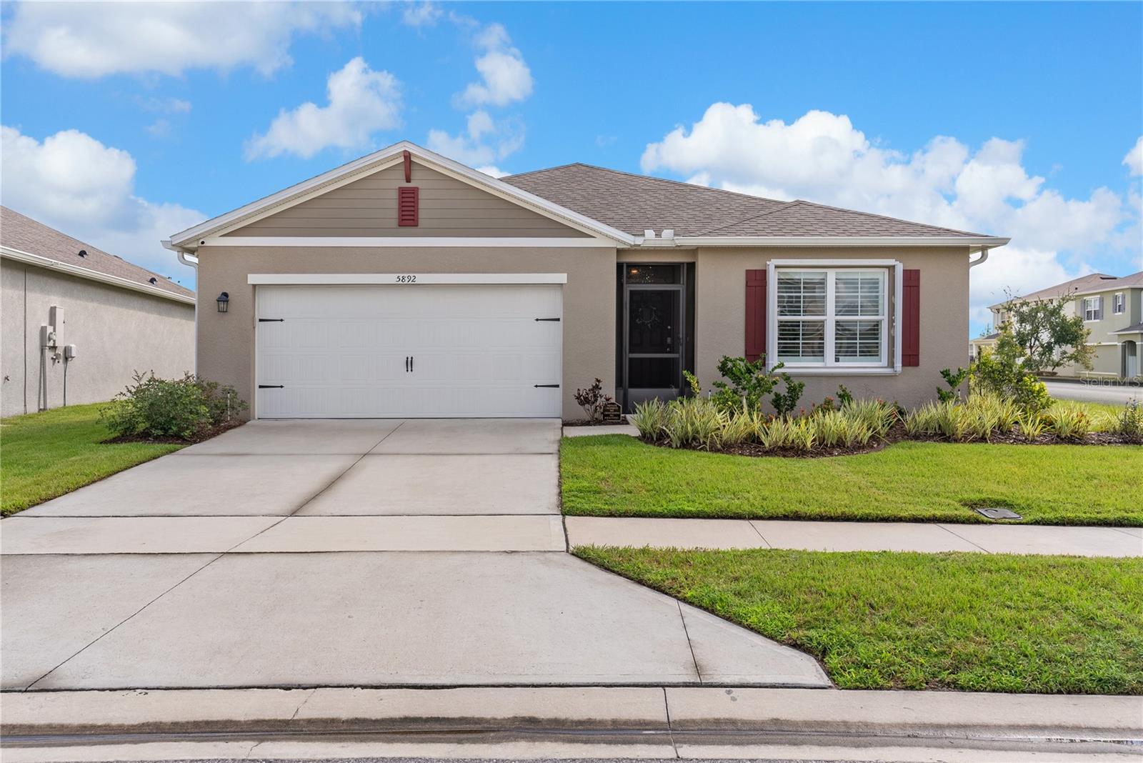 “Welcome Home!! Almost NEW *Impeccably Clean 2022-Built 3 bedroom, 2 Bath Plus Den Pool Home, Ideally located in the Sought-after Riverstone community of Lakeland, FL. High and Dry at 141 ft Elevation, Designed for Modern living, this residence offers a Spacious Open layout paired with Thoughtful Upgrades throughout!
Inside, you’ll find Plantation Shutters, Water softener, Granite Counters, A Large Center Island with seating area, SS Appliances, GE Washer/Dryer, 6 Ceiling Fans, and a Fully Vented Garage. Safety and Convenience are covered in this *Smart Home-controlling thermostat, garage door, and alarm system by a phone app. Hurricane shutters, and a Portable Generator with an Electric panel outlet capable of powering the entire home.
The Primary Suite Features a Beautifully Appointed Bathroom with a Custom Shower door, while the home’s Open Design provides flexibility for Entertaining or working from the den.
Step outside to your Private Backyard Retreat: a Sparkling Saltwater Fiberglass Pool (San Juan, 12x25, 10,000 gallons) with Electric Heater, Robotic Cleaner, and a Pristine Paver Pool Deck. The Pool is Fully Enclosed with a Screened Cage, Privacy Screen, and Enhanced with Starlight Pool Cage Lighting on Timers and Remote Control. A Separate Screened Lanai and Screened Front Entry add to the Indoor-Outdoor Lifestyle.
Additional features include a Vinyl Privacy Fence (shared access to neighboring home), French drain, Gutters and Downspouts, Plus plenty of Storage and Peace of mind.
Riverstone offers a Welcoming Community Setting in Lakeland, Is Golf Cart Friendly, Combining Convenience, Style, Comfort, Location-Perfectly placed between Tampa & Orlando!!—Making this home the Perfect Place to start your next chapter!”
Riverstone Offers Resort-Style living—2 pools, Clubhouse, Playground, Dog Park, and Miles of Sidewalks—All Near Some Wonderful Dining, Shopping, Healthcare, Lakeland Airport, and Top-Rated George Jenkins Schools Offers AP Courses, Gifted and Talented Programs and 22 Sports!!