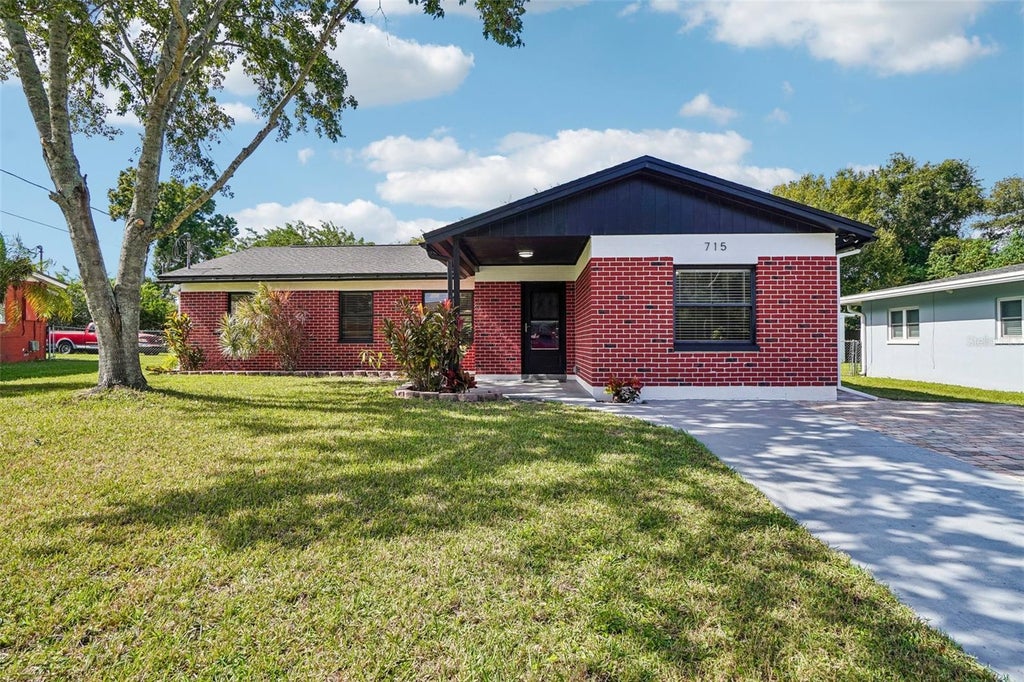 Photo of 715 Papaya Drive, Tampa, FL 33619 (MLS # TB8562902)