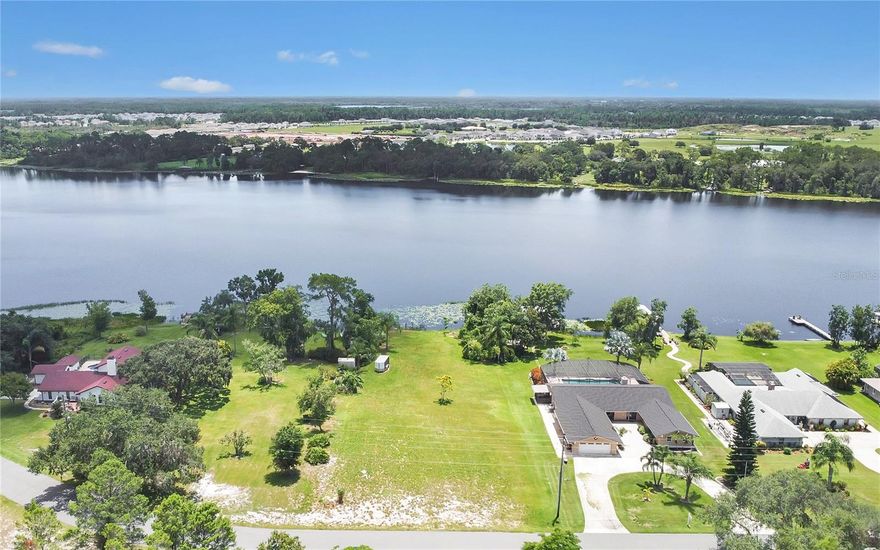 Waterfront Opportunity on Bay Lake – Nearly 1 Acre of Endless Potential

Discover the rare chance to own a piece of lakefront paradise on the peaceful shores of Bay Lake. This stunning parcel offers direct waterfront access, making it an ideal setting for your custom-built home, private retreat, or future investment. With ample space to work with, you’ll have the freedom to design the lifestyle you’ve always imagined—whether that includes a spacious home, pool, detached garage, or outdoor living area.

Set in a quiet, natural environment, the property provides incredible views and a sense of privacy, all while being conveniently located just minutes from St. Cloud, Lake Nona, major highways, and the Medical City corridor. There’s no HOA, giving you flexibility to bring your vision to life, whether you're dreaming of lakefront living year-round or a weekend escape from the city.

Enjoy kayaking, fishing, or simply relaxing by the water from your own backyard. Properties like this—especially with direct access to Bay Lake—are rarely available. Take advantage of this exceptional opportunity and start planning your waterfront future today.