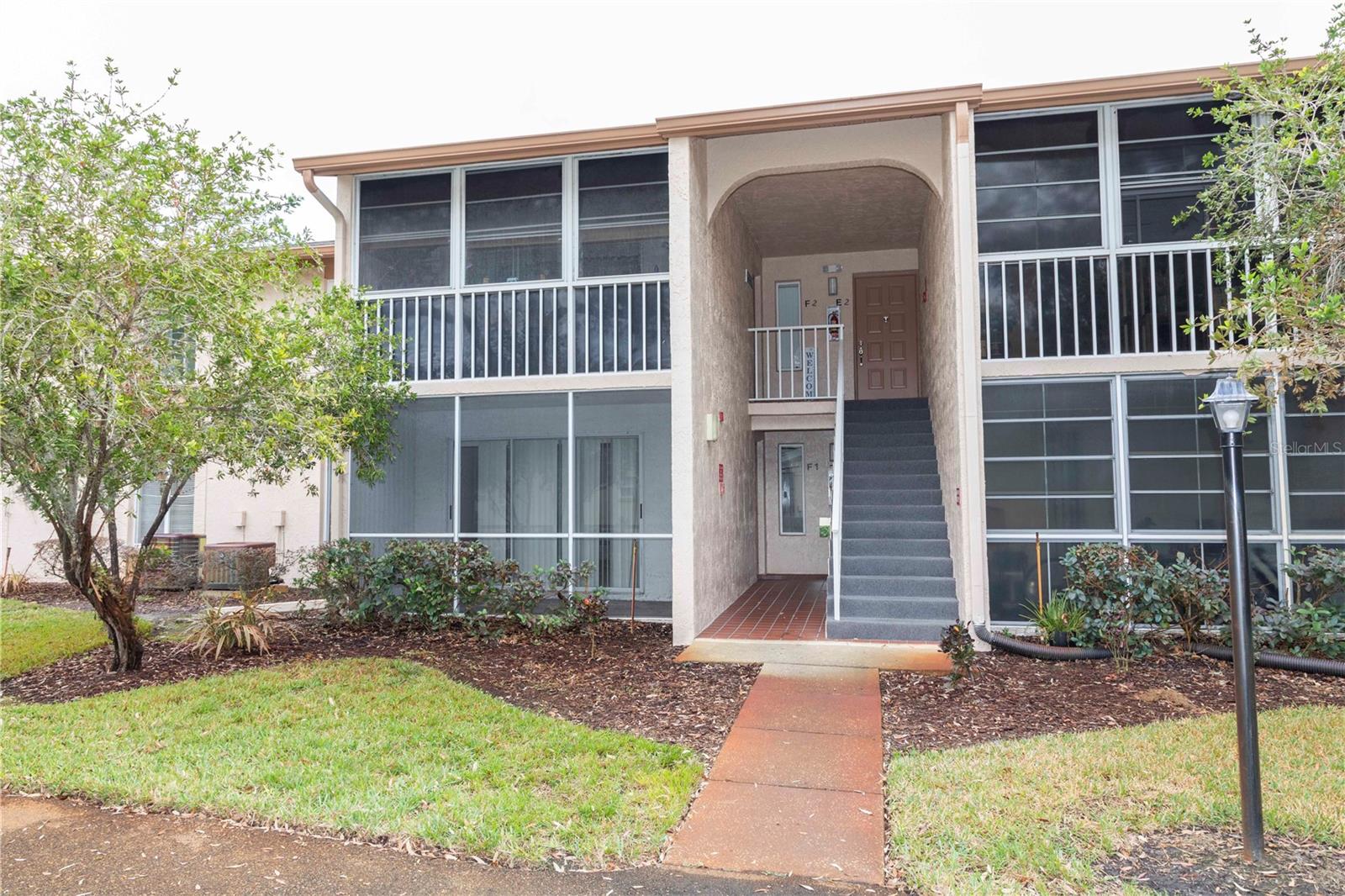 **Welcome Home!** You’re going to love this charming two-bedroom, two-bathroom first-floor condo in the delightful gated community of Pine Ridge at Sugar Creek. It’s the perfect blend of comfort and convenience!
Step into the spacious eat-in kitchen, and picture yourself enjoying meals with family and friends. The master bedroom features a wonderful walk-in closet, providing plenty of space for all your belongings. And just imagine waking up to your own lovely private patio! It’s the ideal spot for sipping your morning coffee or tea while soaking in the peaceful surroundings.
The community takes care of all the maintenance for you! This includes roof, trash pickup, water, lawn care, exterior painting, plus access to tennis courts, a refreshing pool, and a clubhouse. That means you can spend more time doing what you love instead of worrying about chores!
Join the fun and active lifestyle in this vibrant 55+ community, where there are endless opportunities to connect and engage with your neighbors. Plus, the location couldn't be better! You’re just 35 miles from Tampa International and St. Pete/Clearwater Airports, making travel a breeze. Getting to Tampa, Clearwater, Wesley Chapel, and plenty of shopping is easy and enjoyable.
And for those who value health and wellness, you’re only a short drive away from the groundbreaking Moffitt Cancer Complex in Speros, FL, which is an amazing $1.6 billion investment in your future. This isn’t just a condo; it’s a wonderful lifestyle waiting for you. Be sure to check it out before it’s gone!