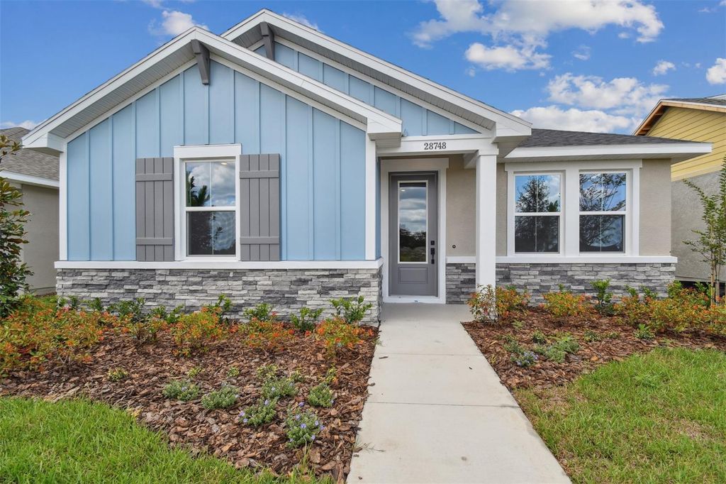 Photo of 28748 Rambutan Drive, Wesley Chapel, FL 33543 (MLS # T3536463)