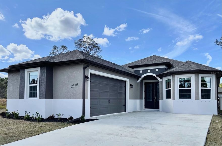 Under Construction. Under Construction! $10K Seller Assistance, can be used for Rate Buy Down or Closing Costs, Buyers Choice! 3/2/2 located in a rapidly growing North Port. Featuring 9.4" high ceilings, 8" interior doors and high end laminate throughout. Close to schools, shopping and I75. Perfect starter home, retirement home or home for anyone best describes this open floor plan. Wood soft close cabinets with granite counter tops in kitchen accompanied by stainless steel appliances and dishwasher. Upgraded finishes like recessed lights and ceiling fans make this a very desired model. Standard 1 year offered. Pictures are from a similar model and finishes may vary. All measurements should be verified by Buyers agent.