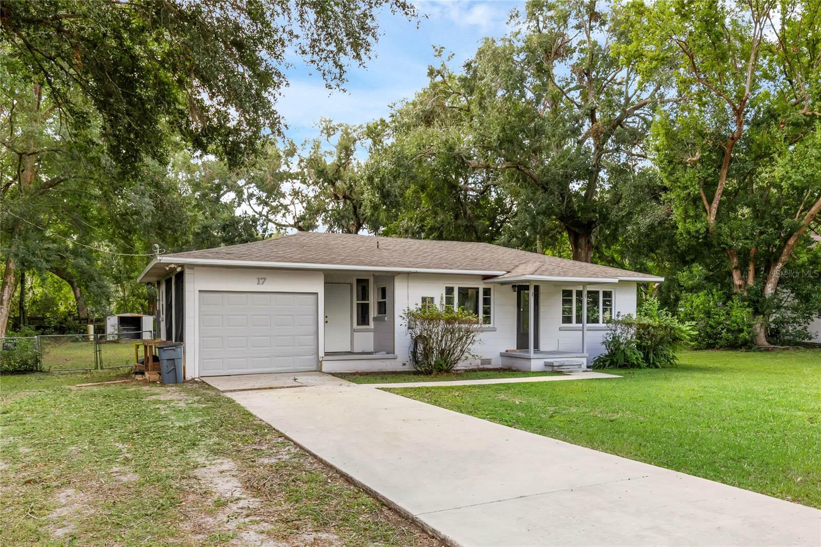 IMPROVED PRICE! This home has all the things....LOCATION! CHARM! LOT! Newly refinished wood floors throughout living area and bedroom, open kitchen and living room, newer (2018) windows, newer HVAC 2022, bonus room and large interior laundry room are some of the many features this home offers - all sited on just under a 1/2 acre lot in beautiful DeBary! Minutes to Sanford's waterfront, Zoo and Downtown Sanford and I-4. Get to the beach in under 45 minutes. Live the Florida life - truly! DeBary is known for its trails and parks as well as its warm, hometown feel. And, now, it's connected to other Central Florida cities by SunRail so you can enjoy living away from all the hubbub of the city and have convenient access via modern public transit and close proximity to major roads and highways. This lovely house is the perfect opportunity to realize your dream of being a homeowner or a great addition to your investment portfolio. Call today to schedule a tour!