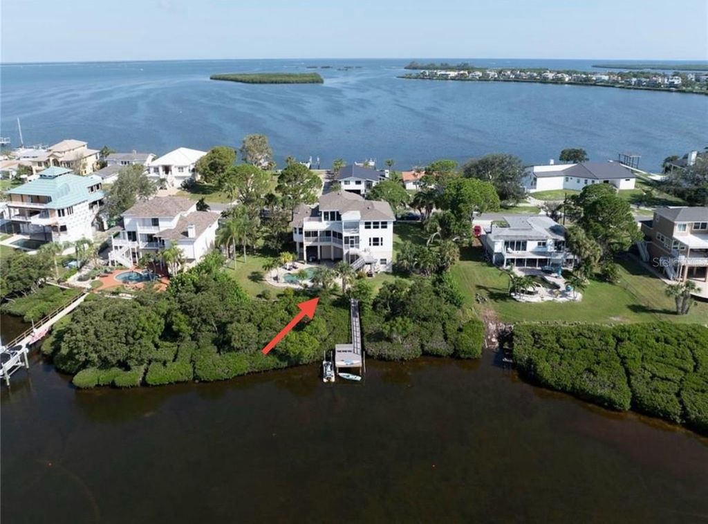 Photo of 1661 Sea Breeze Drive, Tarpon Springs, FL 34689 (MLS # TB8410420)