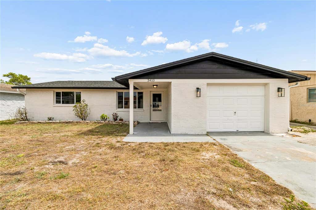 Photo of 3410 Darlington Road, Holiday, FL 34691 (MLS # TB8517872)
