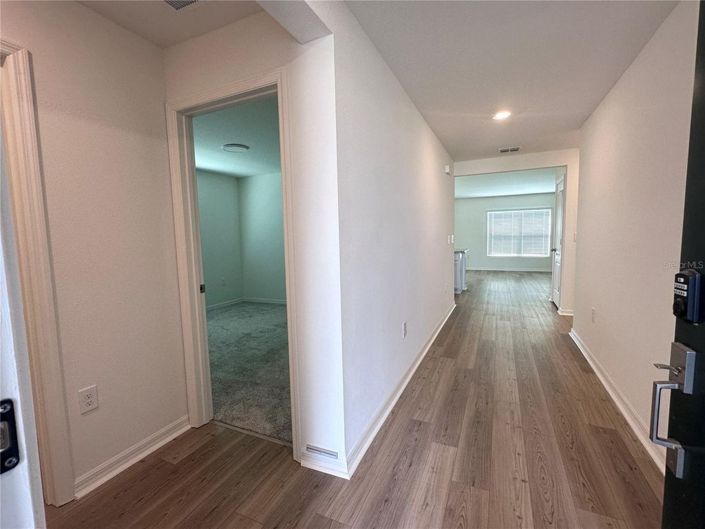 Photo of 148 Summerlin Loop, Haines City, FL 33844 (MLS # O6398419)