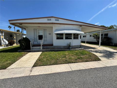 Photo of 2331 Belleair Rd #Lot 237, Clearwater, FL 33764 (MLS # TB8305789)