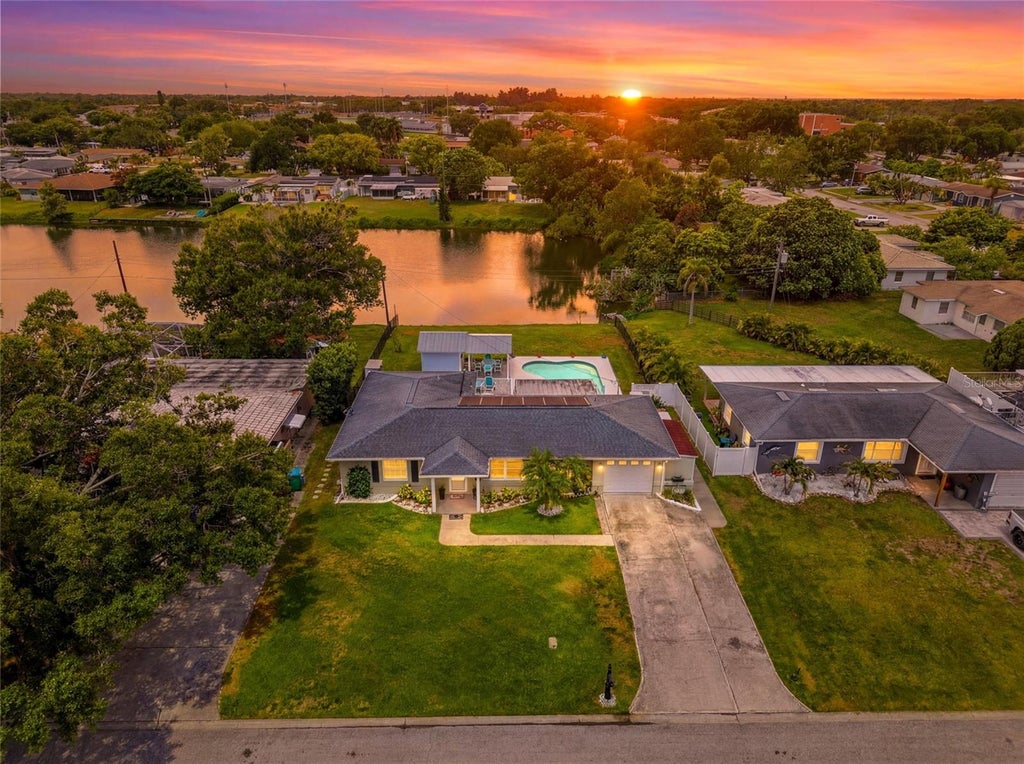 Photo of 4822 60th Way N, Kenneth City, FL 33709 (MLS # TB8524435)