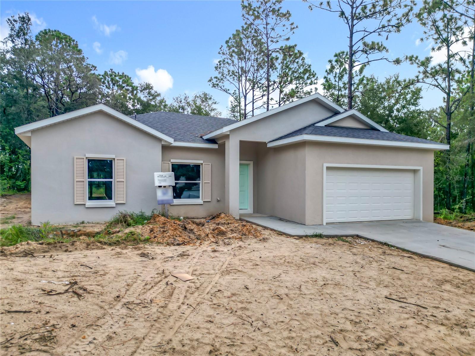 Under Construction. Don’t miss this brand-new home in Citrus Springs, Seller offering closing cost contribution! Featuring 4 bedrooms and 2.5 bathrooms, this property offers a spacious open-concept layout, modern finishes, and quality details throughout. With NO HOA fees, you’ll enjoy flexibility and freedom while still being conveniently close to shopping, dining, and just a short drive to Rainbow River and Hunter Springs. This home is easy to show. Schedule your visit today and see why it’s the perfect fit!