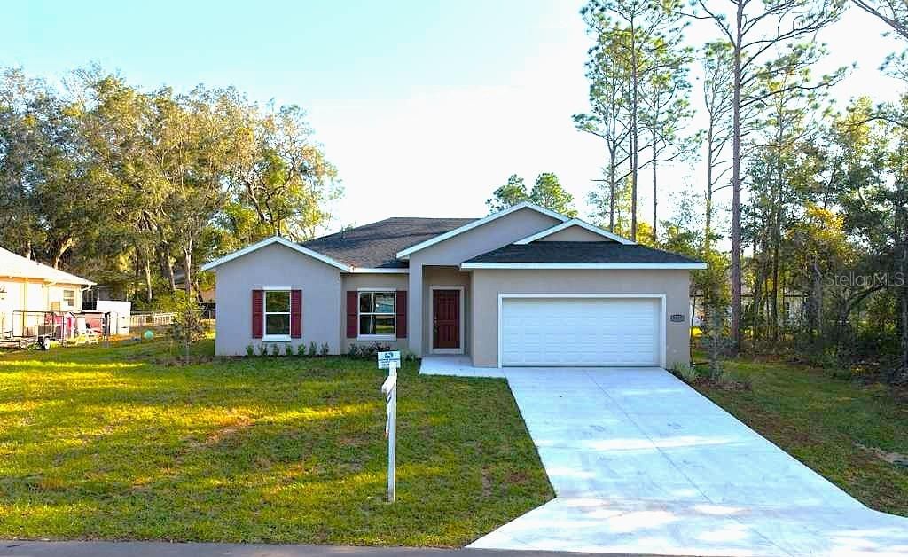 Photo of 8827 N Mendoza Way, Citrus Springs, FL 34434 (MLS # O6339292)
