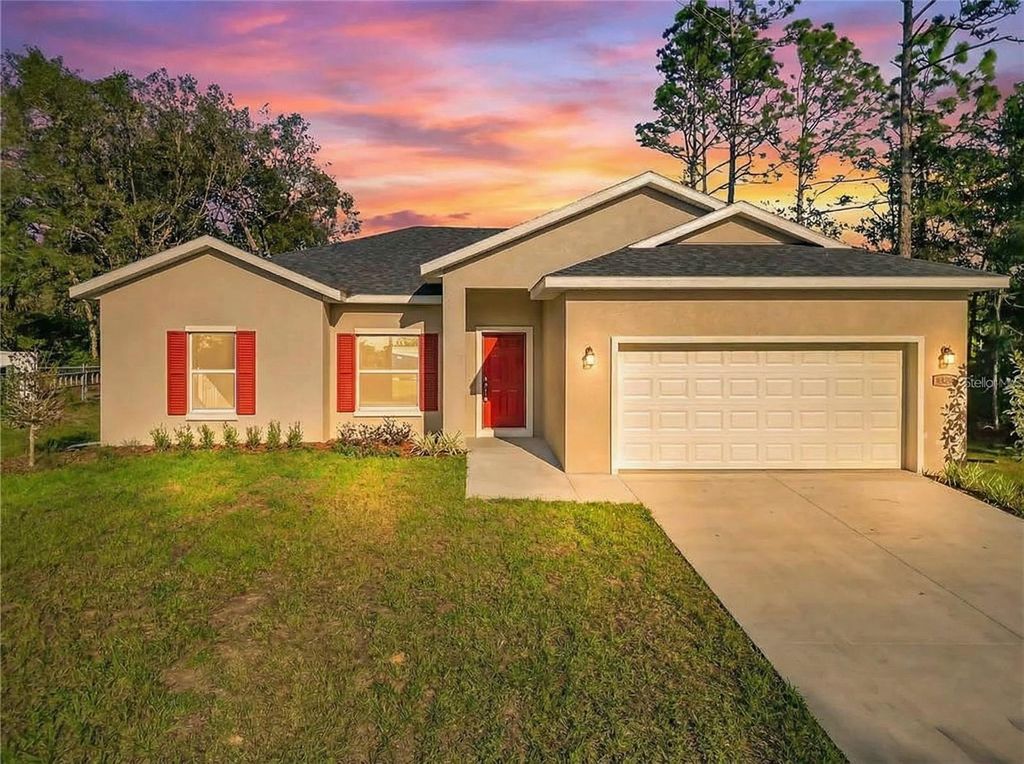 Photo of 8827 N Mendoza Way, Citrus Springs, FL 34434 (MLS # O6339292)