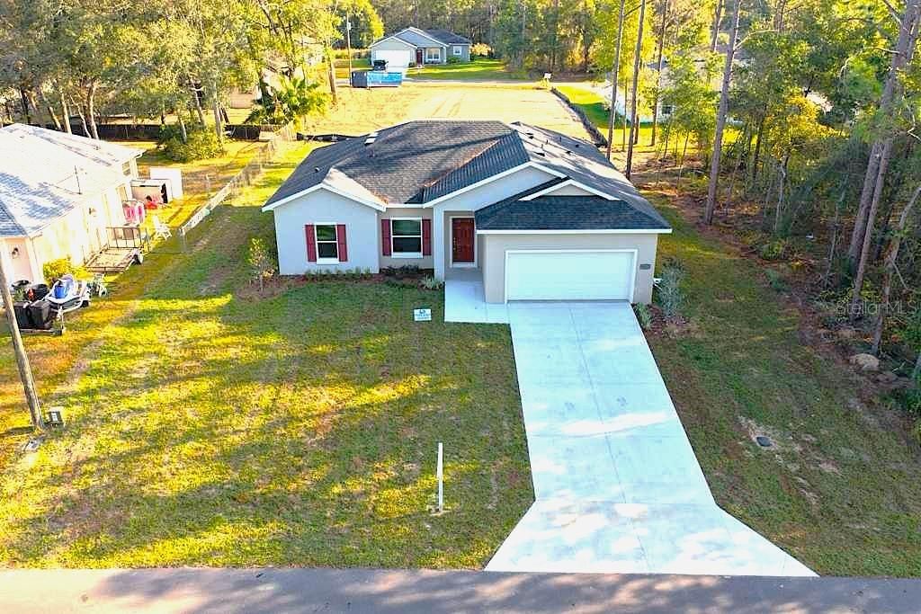 Photo of 8827 N Mendoza Way, Citrus Springs, FL 34434 (MLS # O6339292)