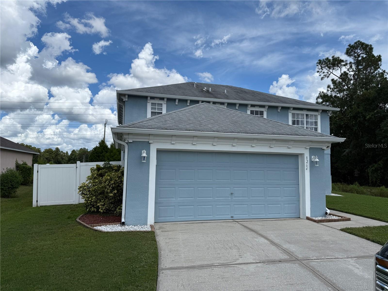 Built in 2006, this spacious two-story home offers 4 bedrooms, 2.5 bathrooms, and over 2,200 square feet of well-planned living space. Situated on a corner lot in the desirable Settlers Creek North community, the property combines modern updates with thoughtful design to meet a variety of lifestyle needs.
The first floor features a welcoming layout with a formal living and dining area, a large family room, and a versatile den/bonus space. The kitchen includes updated cabinetry, butcher-block style countertops, stainless steel appliances, dual pantries, an island workspace, and French doors that open to the backyard. Tile and wood-look flooring throughout the living areas make the home both attractive and easy to maintain.
Upstairs, the private owner’s suite includes dual walk-in closets, a large bathroom with separate vanities, a garden tub, and a separate shower. The additional bedrooms are generously sized and share convenient access to the secondary bathroom. An upstairs laundry room adds everyday convenience.
Recent updates include a roof and HVAC system replaced approximately four years ago, providing peace of mind and energy efficiency. Additional features include ceiling fans throughout, blinds/shades, a walk-in attic, and an attached 2-car garage.
The exterior offers a fenced yard with privacy PVC fencing and views of a water retention area, creating a comfortable outdoor setting. The community is quiet and established, with a low monthly HOA fee.
Located near shopping, dining, schools, and commuter routes, this property balances comfort, function, and location—ideal for those seeking space and flexibility in Lakeland.
Located in a desirable neighborhood, this property combines modern comfort with lasting quality. Don’t miss your chance to make this house your home!