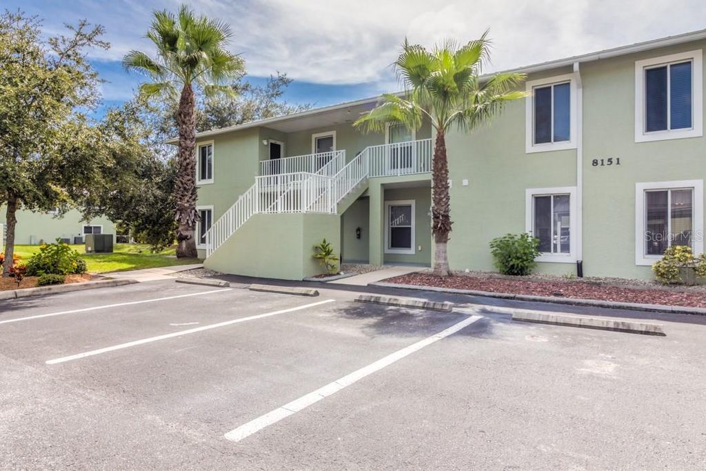 Photo of 8151 Memory Lane #118, Rotonda West, FL 33947 (MLS # D6146828)