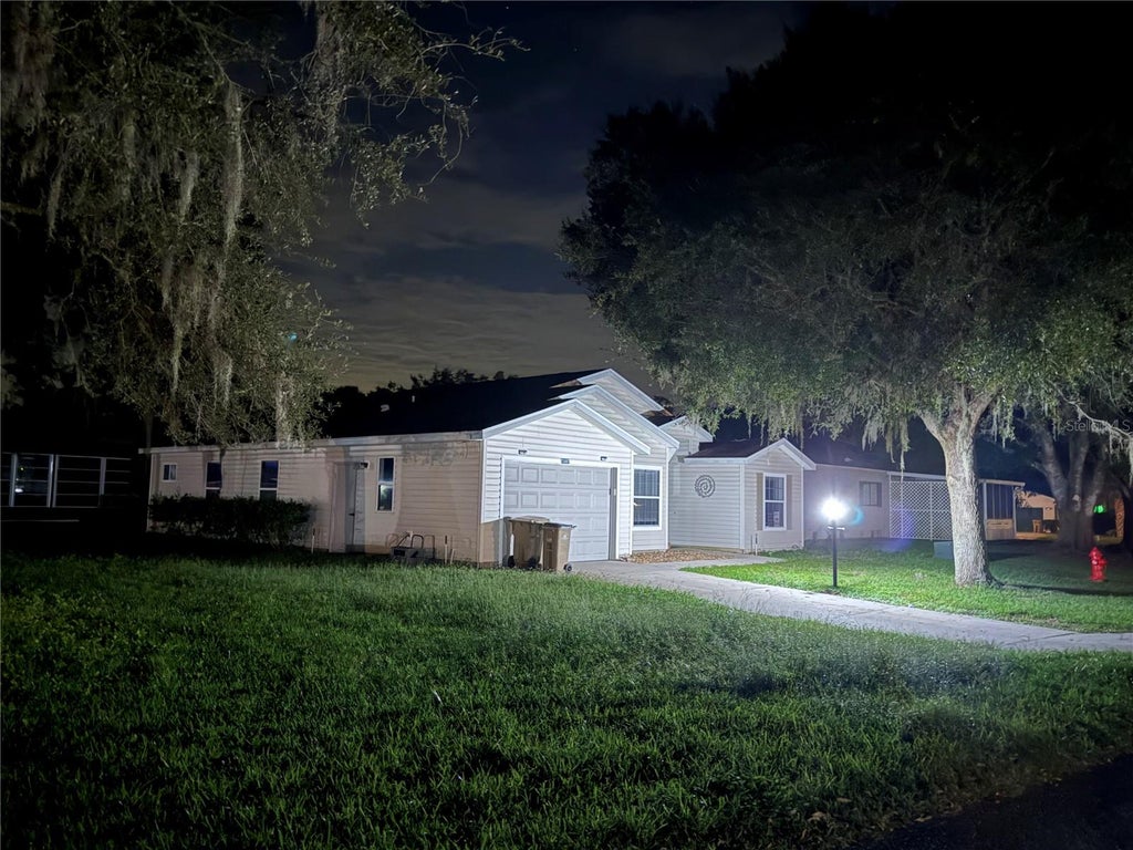 Photo of 25607 Belle Helene, Leesburg, FL 34748 (MLS # G5106688)