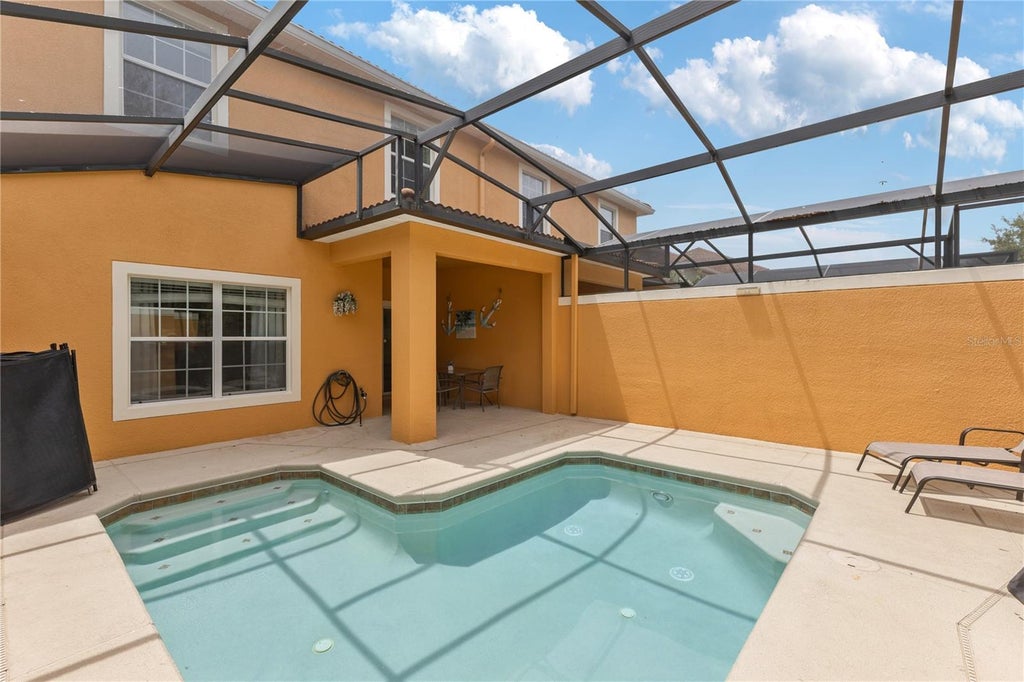 Photo of 2911 Banana Palm Drive, Kissimmee, FL 34747 (MLS # O6446672)