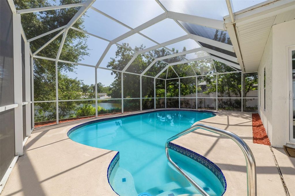 Photo of 2436 Beacon Groves Boulevard, Palm Harbor, FL 34683 (MLS # TB8391052)