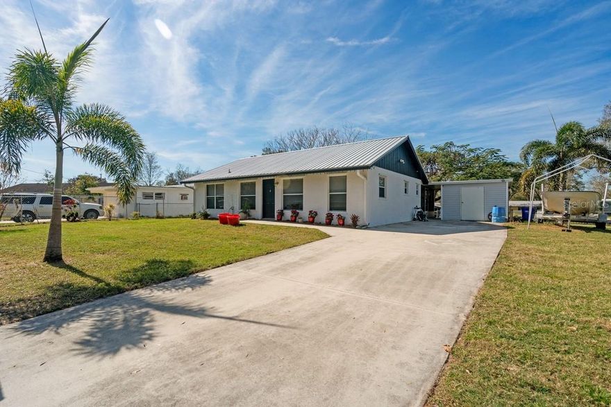Taylor Creek Canal. Attention Boating Enthusiasts, Experience Waterfront living at its finest, from day trips to the Bahamas to fishing on Lake Okeechobee this amazing property is the one you have been looking for!  Situated directly on Taylor Creek Canal, with 75' feet of canal frontage, an oversized dock, accommodating over a 50' vessel, with Lake Okeechobee, gulf and Ocean access. From the moment you enter and see the open floorplan, and gourmet kitchen, you'll know this exquisite 2-bedroom 2-bath, 1860' CBS home is the one for you! This amazing home has too many features to list, it's a Must see, all measurements approx. Adjoining Parcel available. Call Today!