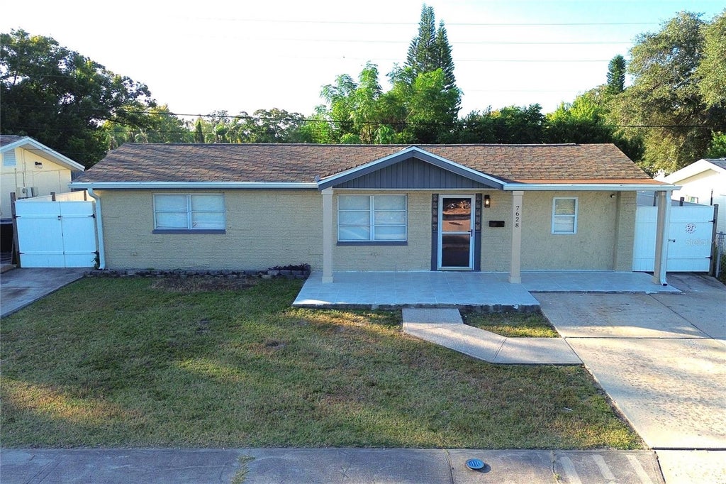 Photo of 7628 Coventry Drive, Port Richey, FL 34668 (MLS # TB8563163)