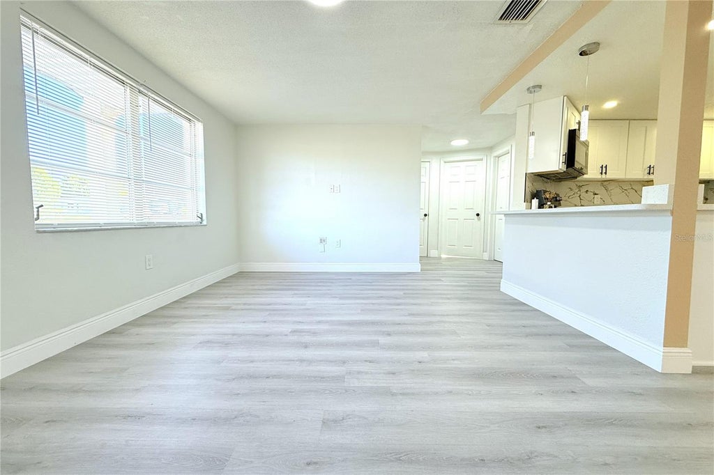 Photo of 7628 Coventry Drive, Port Richey, FL 34668 (MLS # TB8563163)