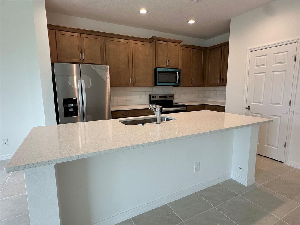 Photo of 676 Birdswill Lane, Deland, FL 32724 (MLS # O6368563)