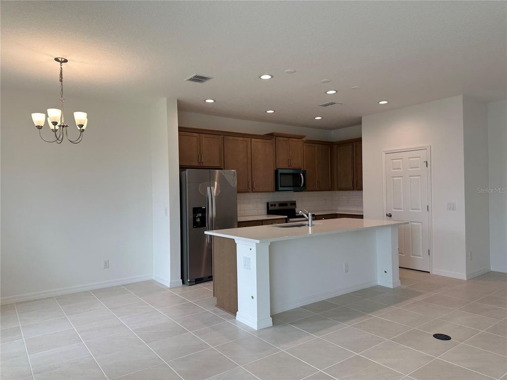 Photo of 676 Birdswill Lane, Deland, FL 32724 (MLS # O6368563)