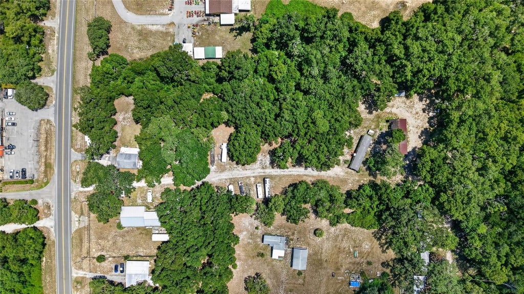 Photo of 3362 N Carl G Rose Highway, Hernando, FL 34442 (MLS # OM728154)