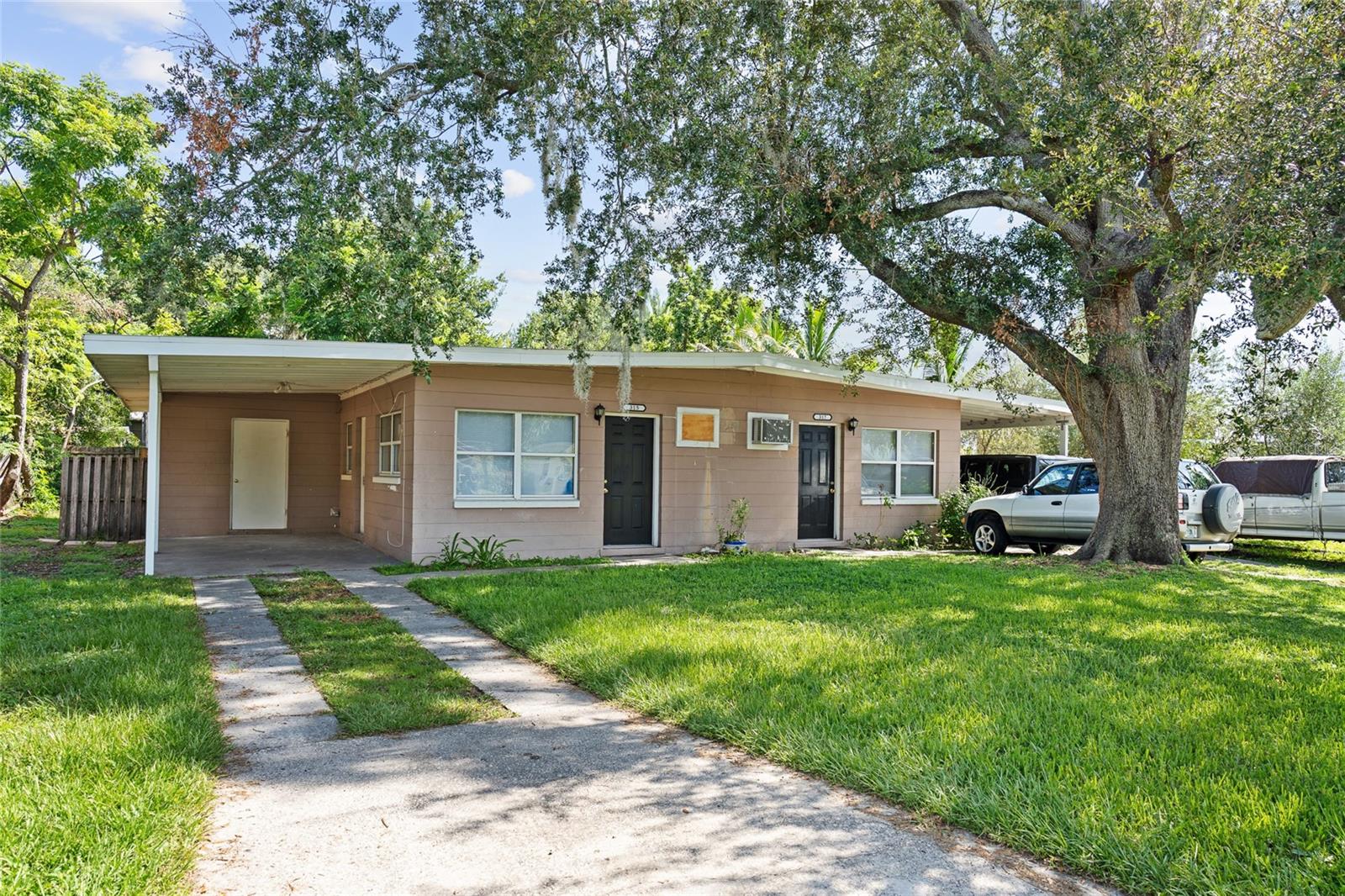 Under contract-accepting backup offers. Prime Investment Opportunity in Orlando!
Welcome to 315 Fairlane Ave, a well-maintained duplex ideally located in the heart of Orlando! Offering a combination of modern updates and excellent rental potential, this property is a must-see for savvy investors or those looking to house hack.
Location, Location, Location:
Nestled in a highly sought-after area, this duplex is just minutes from Downtown Orlando, SoDo, and the Orlando International Airport. Whether you’re commuting or enjoying local dining, shopping, and entertainment, the location couldn’t be more convenient. Plus, with easy access to public transportation, you’ll never be far from anything you need!
Income-Producing Units:
Both units are designed for income generation. One side has been rented to a reliable tenant since 2018, with their lease set to expire in February. The other side is move-in ready and expected to generate a minimum of $1,500 per month in rental income. This makes for an excellent opportunity to start earning right away.
Modern Living Spaces:
Each unit features 2 bedrooms, 1 bathroom, and an open kitchen/living area that maximizes space and functionality. The remodeled unit boasts a brand-new kitchen, updated flooring, stylish ceiling fans, and a modernized bathroom – all the work has been done for you! The vacant unit is completely move-in ready with new finishes throughout.
Private and Practical:
Each unit comes with its own fenced yard and a 1-car carport with additional driveway parking. Plus, with an outside laundry room and a new hot water heater, maintenance is a breeze!
Maintenance-Free Living:
This property has been thoughtfully updated with a newer roof (2021), new hot water heaters (2025), new HVAC systems (2025), complete re-plumbing, and energy-efficient double-paned windows. It’s ready to go with minimal upkeep, ensuring long-term value and peace of mind for the next owner.
Whether you’re a first-time investor or looking to add to your portfolio, this property is ready to deliver immediate returns. Don’t miss out on this exceptional opportunity – schedule your showing today!