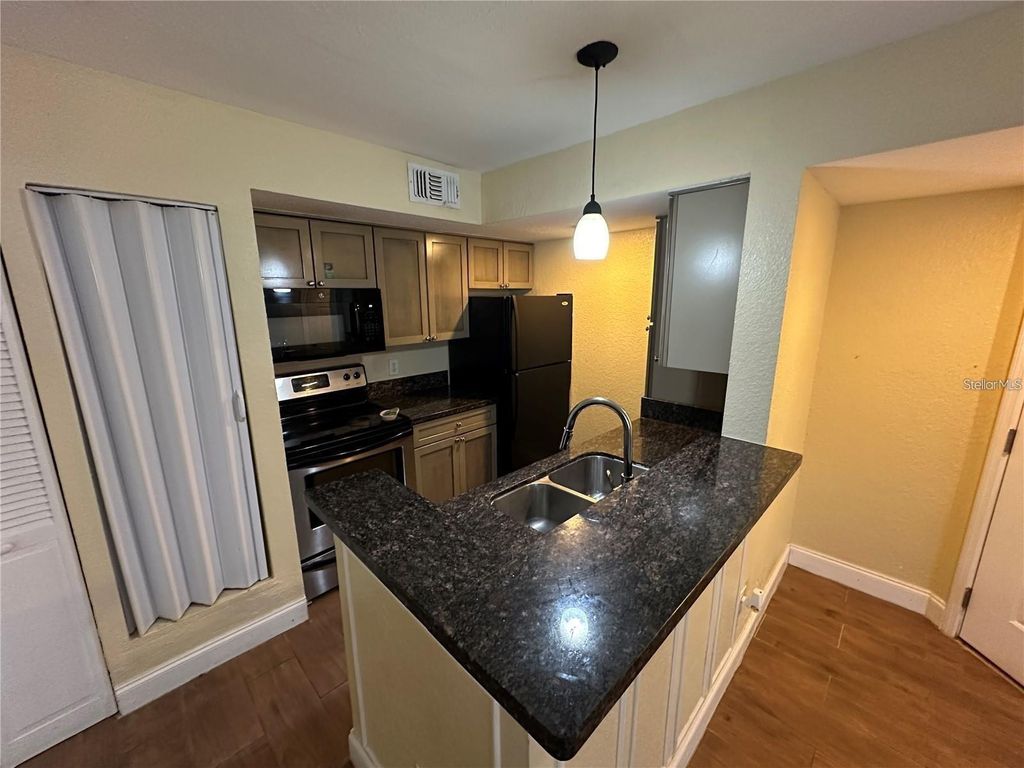 Photo of 5108 Conroy Road #1713, Orlando, FL 32811 (MLS # S5143508)