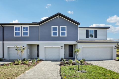 Photo of 717 Spartina Way, Lady Lake, FL 32159 (MLS # O6361172)