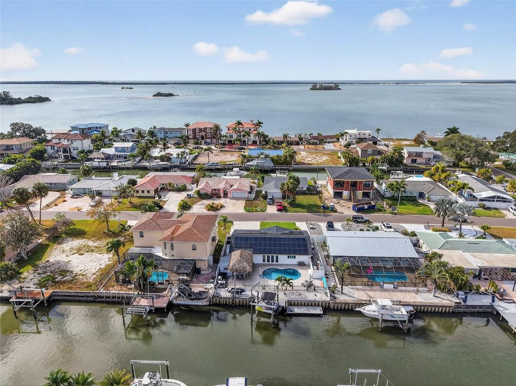 Photo of 2171 Lagoon Drive, Dunedin, FL 34698 (MLS # TB8489087)