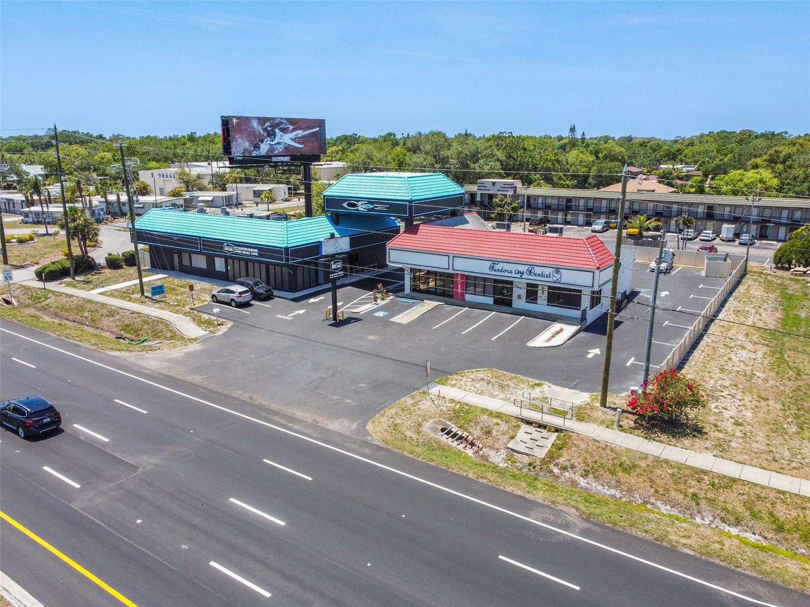 We are proud to present for sale to qualified investors, the opportunity to purchase a fee simple interest in 28540 US Hwy 19 N, Clearwater, FL 33761 (the "Property") and accompanying billboard ground lease. The Property is 100% tenant occupied, home to INSA Cannabis Dispensary and Fundora My Dentist, both on long-term NNN leases. This passive investment has 3% annual escalations and options to extend. Additional rental income included with the billboard ground lease. Per property appraiser records, in 2022 the property underwent over $1,100,000 estimated value of interior capital improvements representing an intense financial commitment by both tenants, $850,000 and $292,152 respectively. The Property is front and center on US Hwy 19 (95,000 "AADT") with over 200 feet of direct frontage, A+ visibility, and signage. Please review the Offering Memorandum for additional information.
