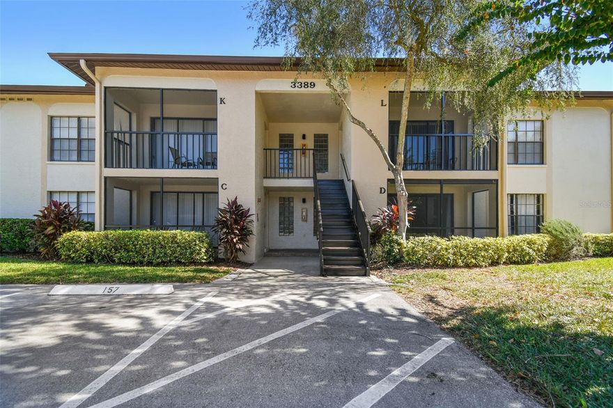 Welcome to Crystal Lake! You will feel at home from the moment you enter the community. This first floor 2bedroom/1bath has been tastefully updated throughout. The wood-like vinyl flooring runs through the main living area and kitchen. Kitchen has been updated with granite countertops, subway tile backsplash, and stainless steel appliances. There is a indoor walk-in laundry closet with full size washer and dryer included. Both bedrooms are spacious and each has their own walk in closet for plenty of storage. The bathroom has tile flooring, tub/shower combo, and updated tile shower. This unit also offers private screened lanai that has been updated with pavers. The screened lanai also offers a personal storage closet for additional storage. The AC is 2022 and water heater 2020. Water, Sewer, Trash included in monthly HOA dues. This is an all ages community and the location offers easy access to a variety of local activities including YMCA and Lansbrook Golf Course within walking distance, as well as local walking paths and preserve areas to enjoy. Other nearby attractions include Lake Tarpon, Shopping & Restaurants, Libraries and easy access to Tampa International Airport and Florida's Top Beaches! Freshly painted exterior and new screens installed on the lanai by the HOA. Call today to schedule your private showing.