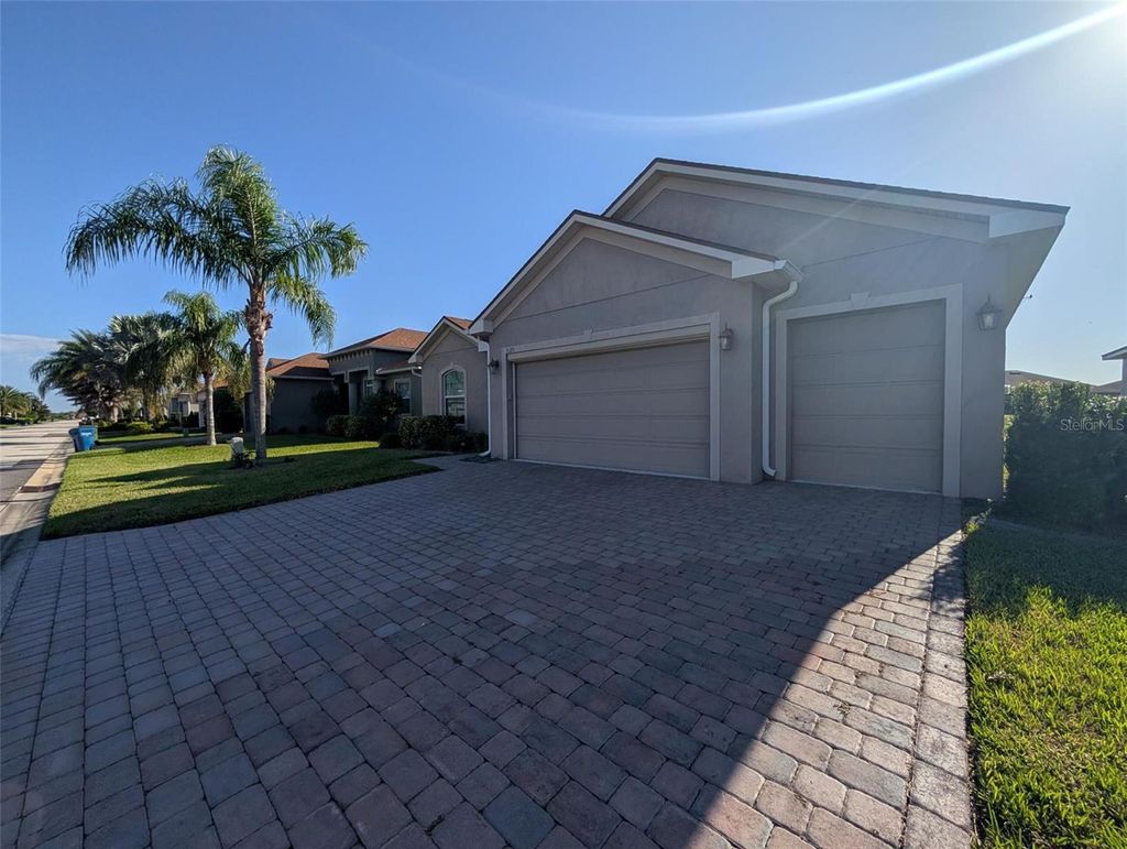 Photo of 5225 Pebble Beach Boulevard, Winter Haven, FL 33884 (MLS # P4936039)