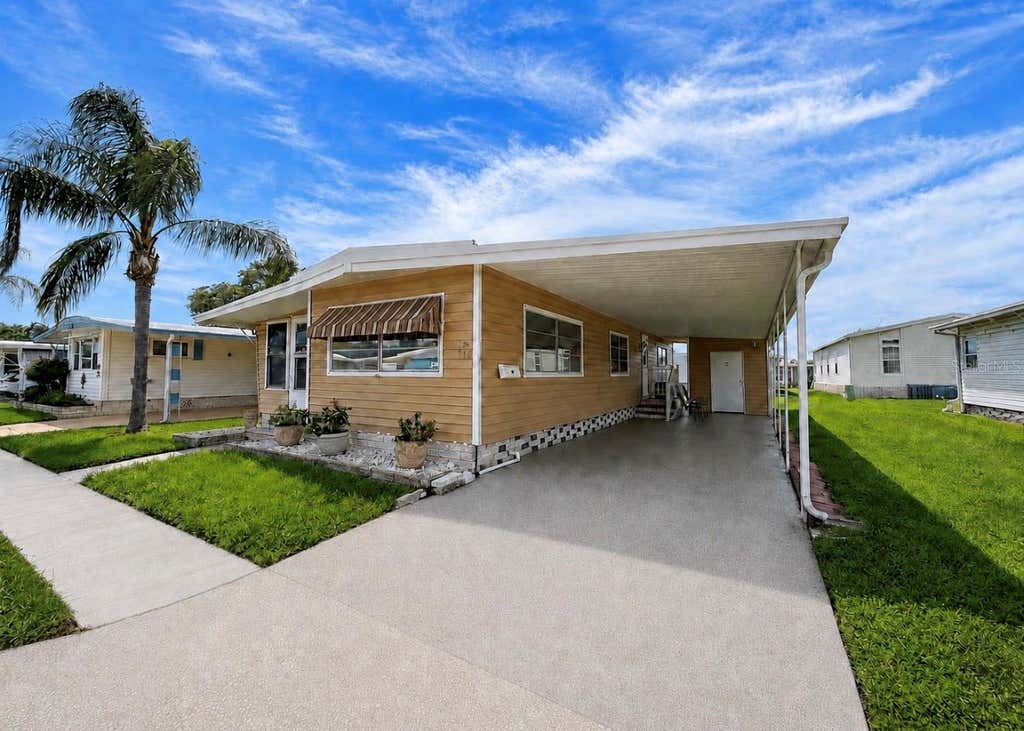 Photo of 1100 Belcher Road S #116, Largo, FL 33771 (MLS # TB8542521)