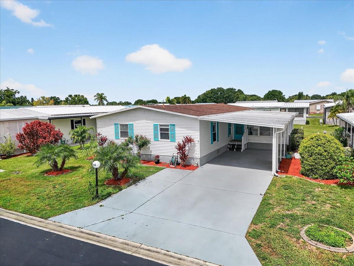 Welcome to Seminole Cove – A Gated 55+ Community with Resort-Style Amenities! This beautifully maintained 3-bedroom, 3-bathroom double-wide home offers over 1,500 sq ft of living space, plus a 14x14 Florida room and a convenient carport. Step inside to fresh interior paint, brand-new laminate flooring, and a fully updated 13x14 kitchen—perfect for both daily living and entertaining.
Both 13x18 en suite bedrooms include spacious walk-in closets and French doors for added style and function. A beautifully updated laundry and pantry room sits adjacent to the eat-in kitchen, while the 8x14 utility room provides even more storage space. Recent updates include a 2014 roof and a 2022 A/C system. The home is serviced by city water and sewer, with a separate well for irrigation.
Enjoy outdoor perks like double driveway parking, boat storage, and a secured lot for RVs and extra vehicles. Community amenities include a heated pool, clubhouse with planned activities, a boat ramp, a catch-and-release fishing lake, and a fish-cleaning station.
HOA is only \$114/month. Room dimensions are approximate and should be verified by the buyer.