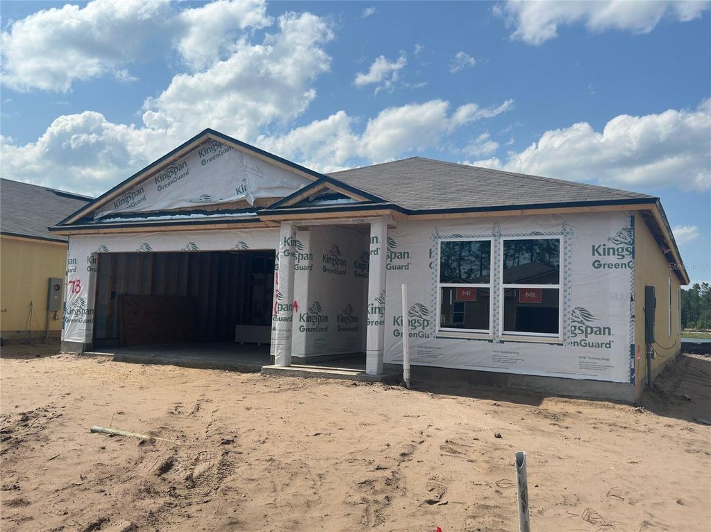 Photo of 73 Hulett Woods Road, Palm Coast, FL 32137 (MLS # FC301181)