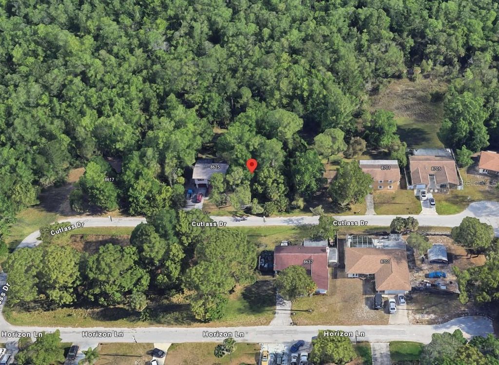 Photo of 8629 Cutlass Drive, Hudson, FL 34667 (MLS # O6347028)