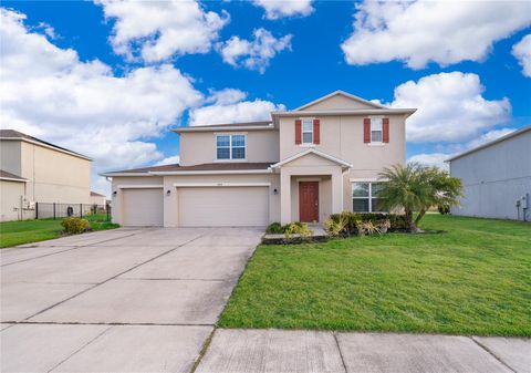 Photo of 404 Quarry Rock Circle, Kissimmee, FL 34758 (MLS # O6377828)