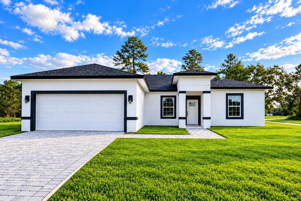 Photo of 2827 SW 161st Loop, Ocala, FL 34473 (MLS # O6451896)